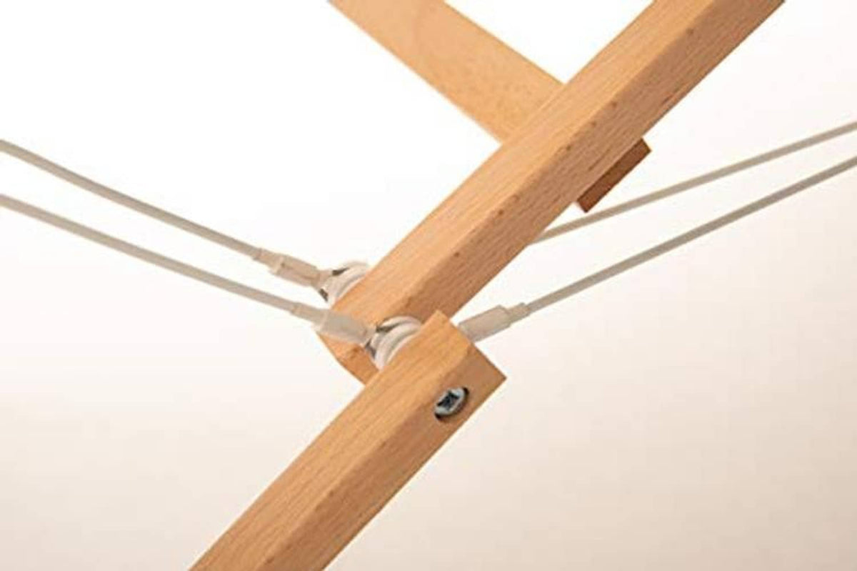 Wooden folding support joint with securing strap on portable massage table frame