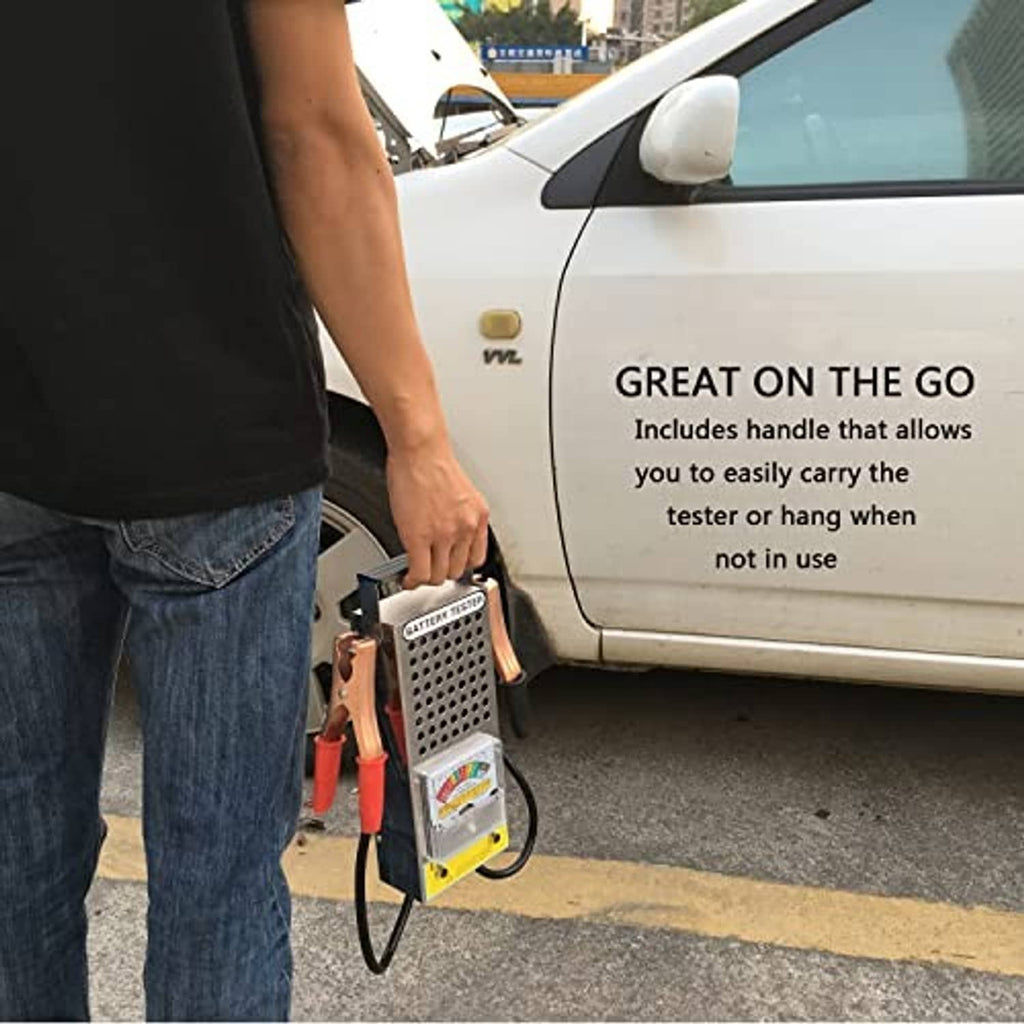 Handheld battery tester with leads and clamps near a car, compact portable design