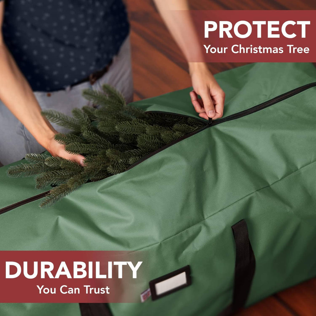Green waterproof Christmas tree storage bag with zippered top and black carry handles