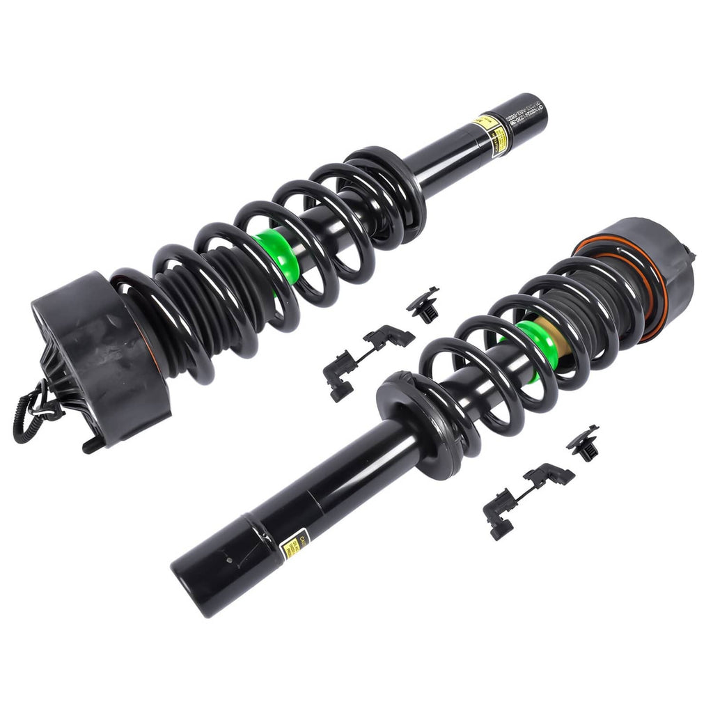 Front shock strut pair with black coil springs, green markers, and included mounting clips