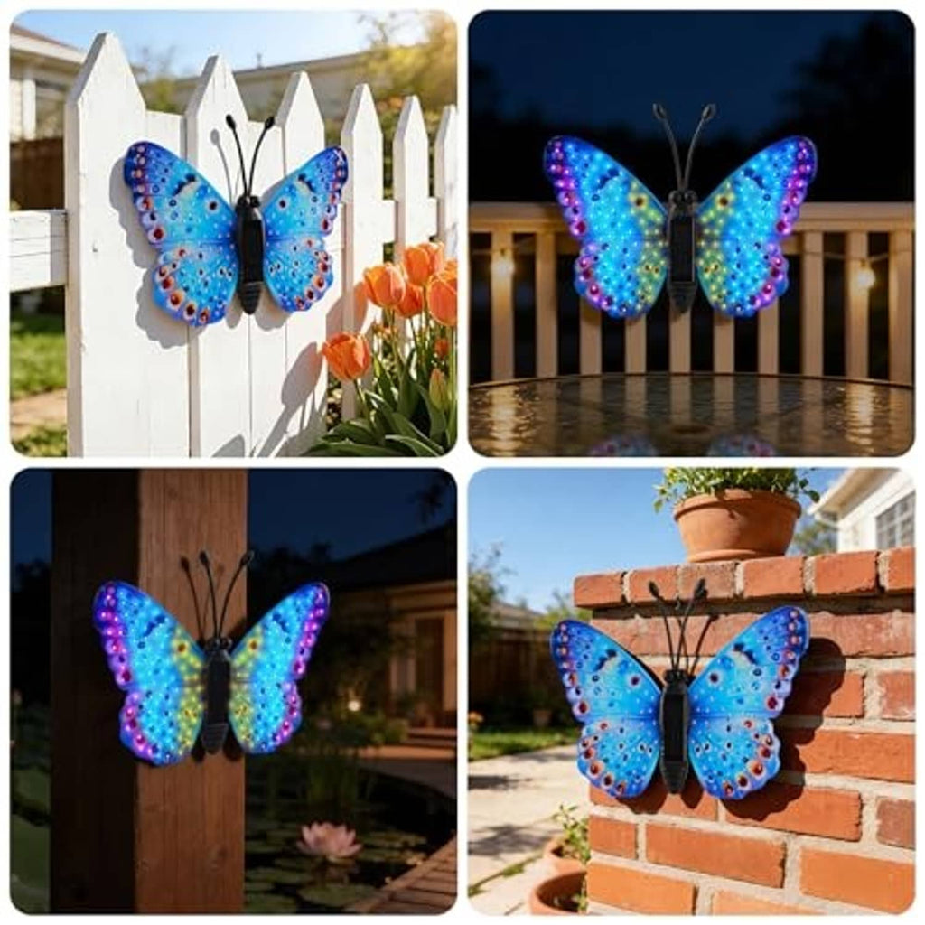 Solar LED butterfly wall decor with multicolor glowing wings, shown on fence and brick