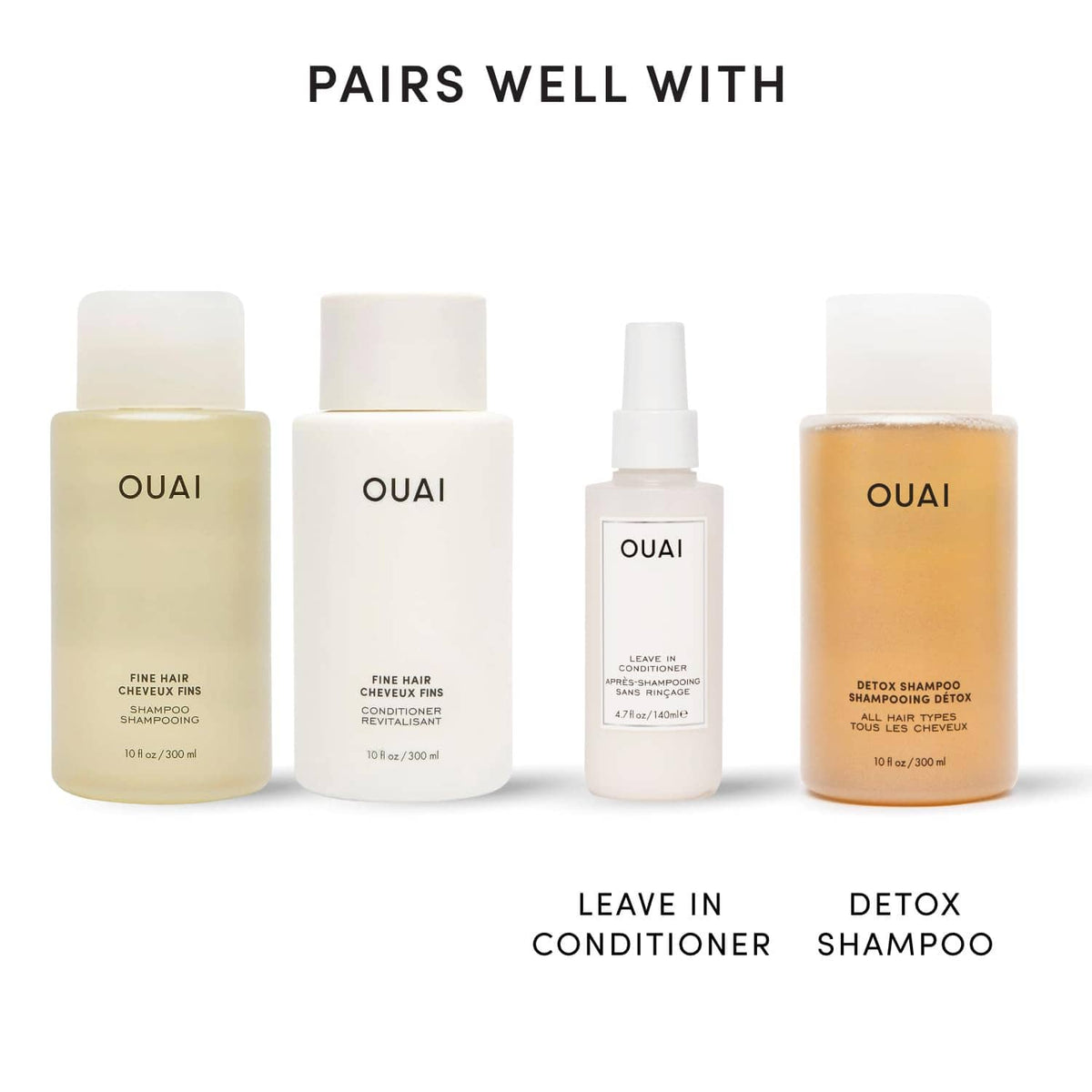 Fine hair care set with four OUAI bottles, cream-gold, white, spray, and amber.