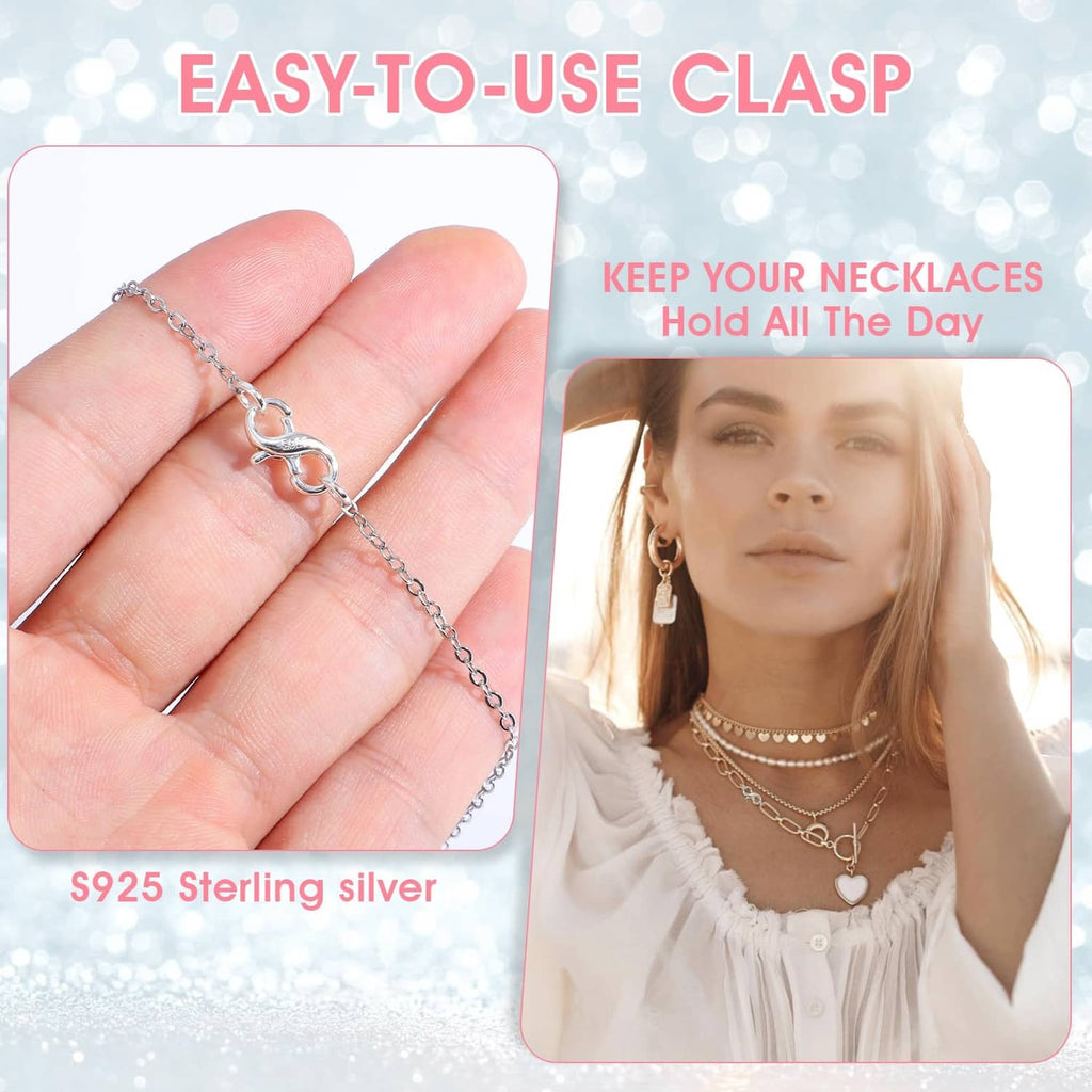 925 sterling silver clasp on necklace chain resting on an open hand