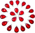 Set of red teardrop crystal charms with silver-tone top loops, assorted sizes.