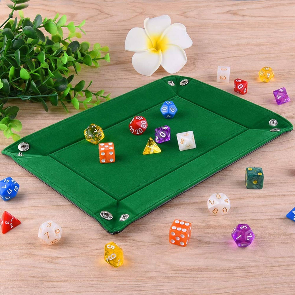 Green folding dice tray with stitched edges, filled with scattered polyhedral dice