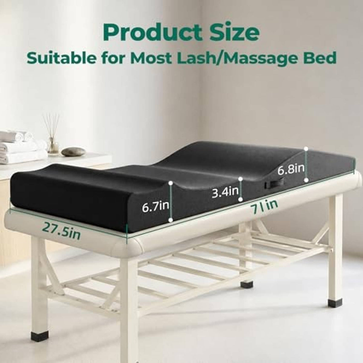 Black curvy foam topper for lash or massage beds on a white folding table