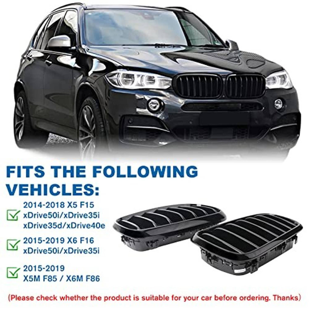 Gloss black front kidney grilles with single vertical slats on a dark SUV front fascia.
