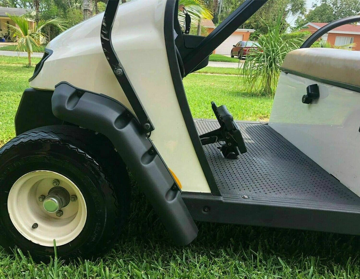 Black front fender flare mounted beside a tire on an EZGO TXT golf cart