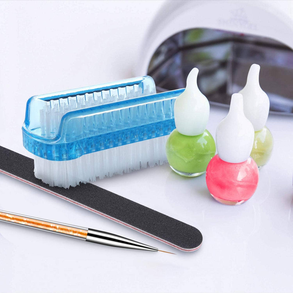 Dual-sided nail brush on tray with colorful nail polish bottles