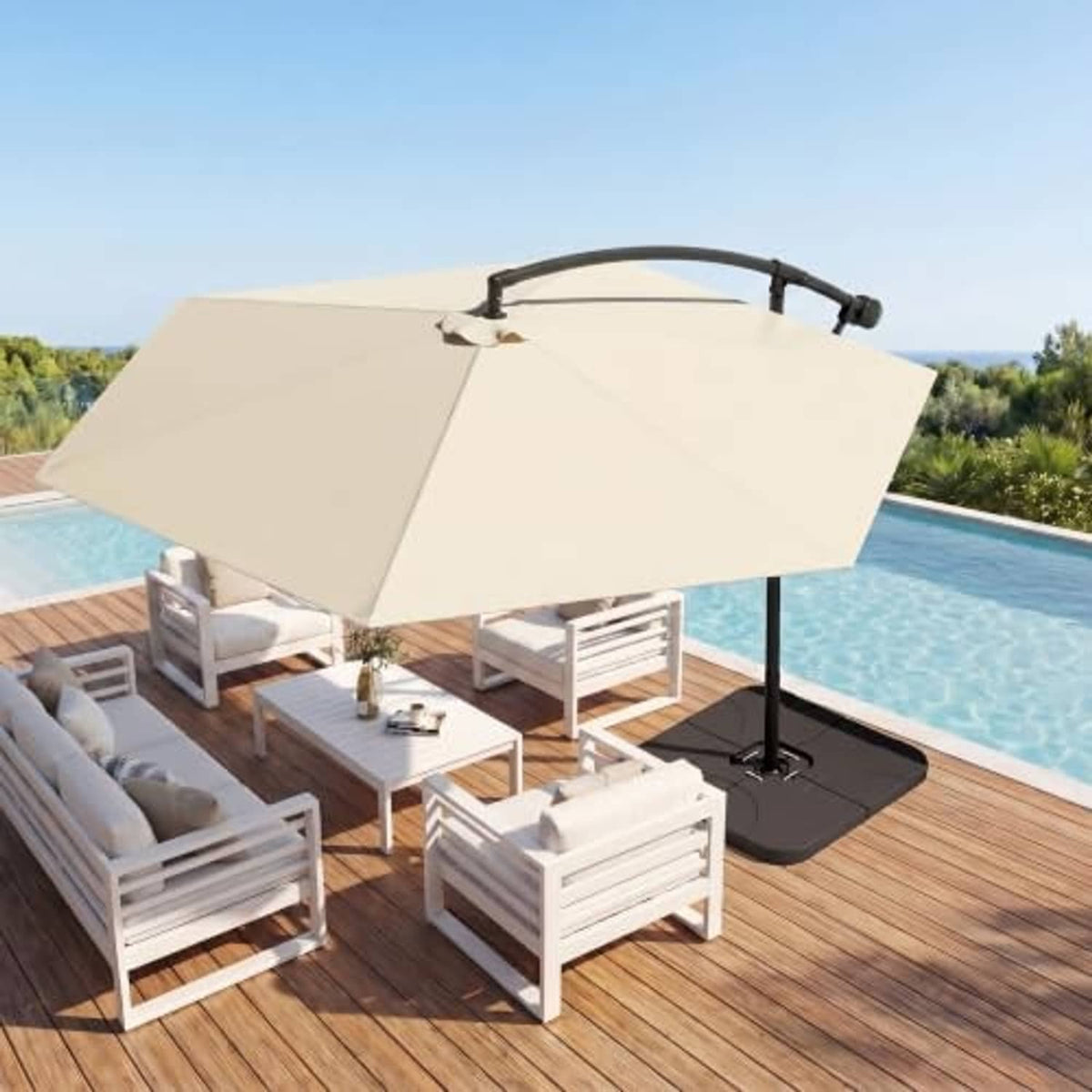 Beige offset patio umbrella over outdoor seating near a pool