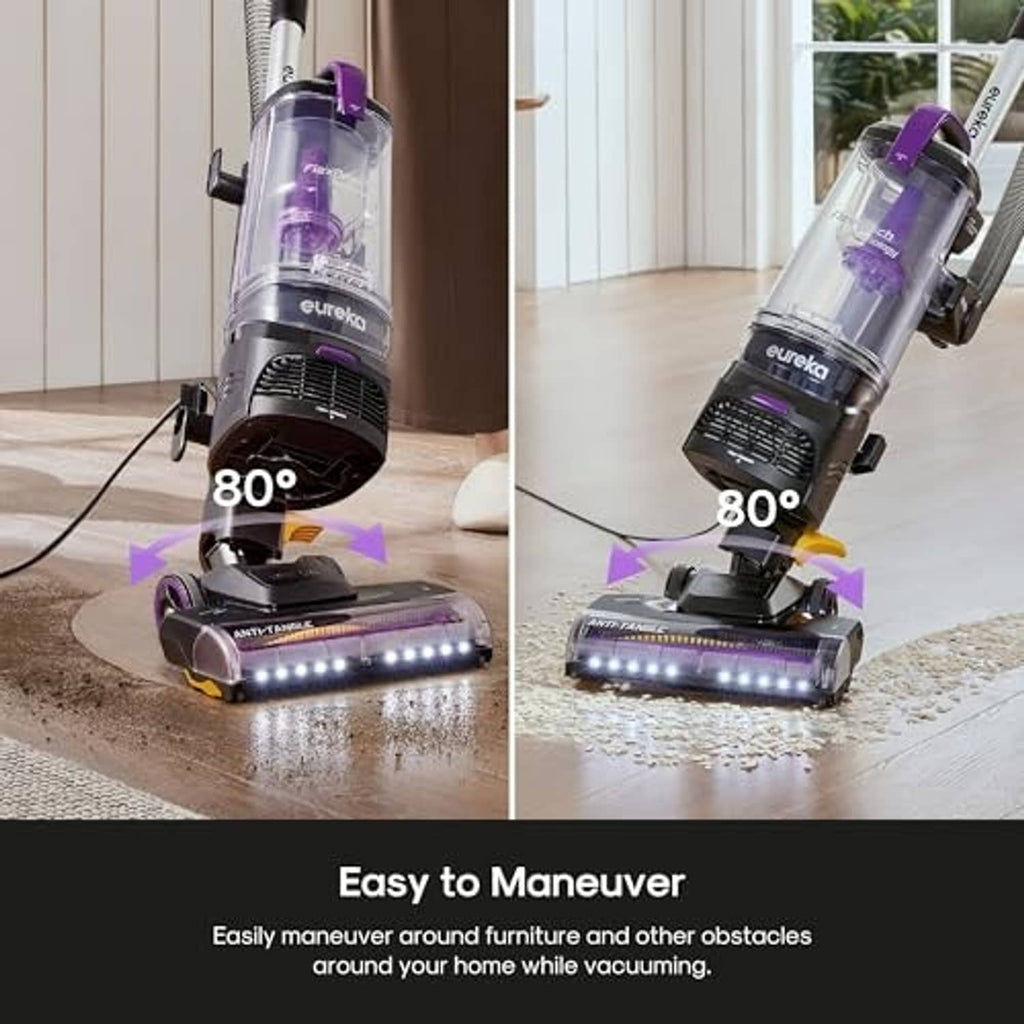 Upright vacuum cleaner cleaning close to furniture with illuminated brush head
