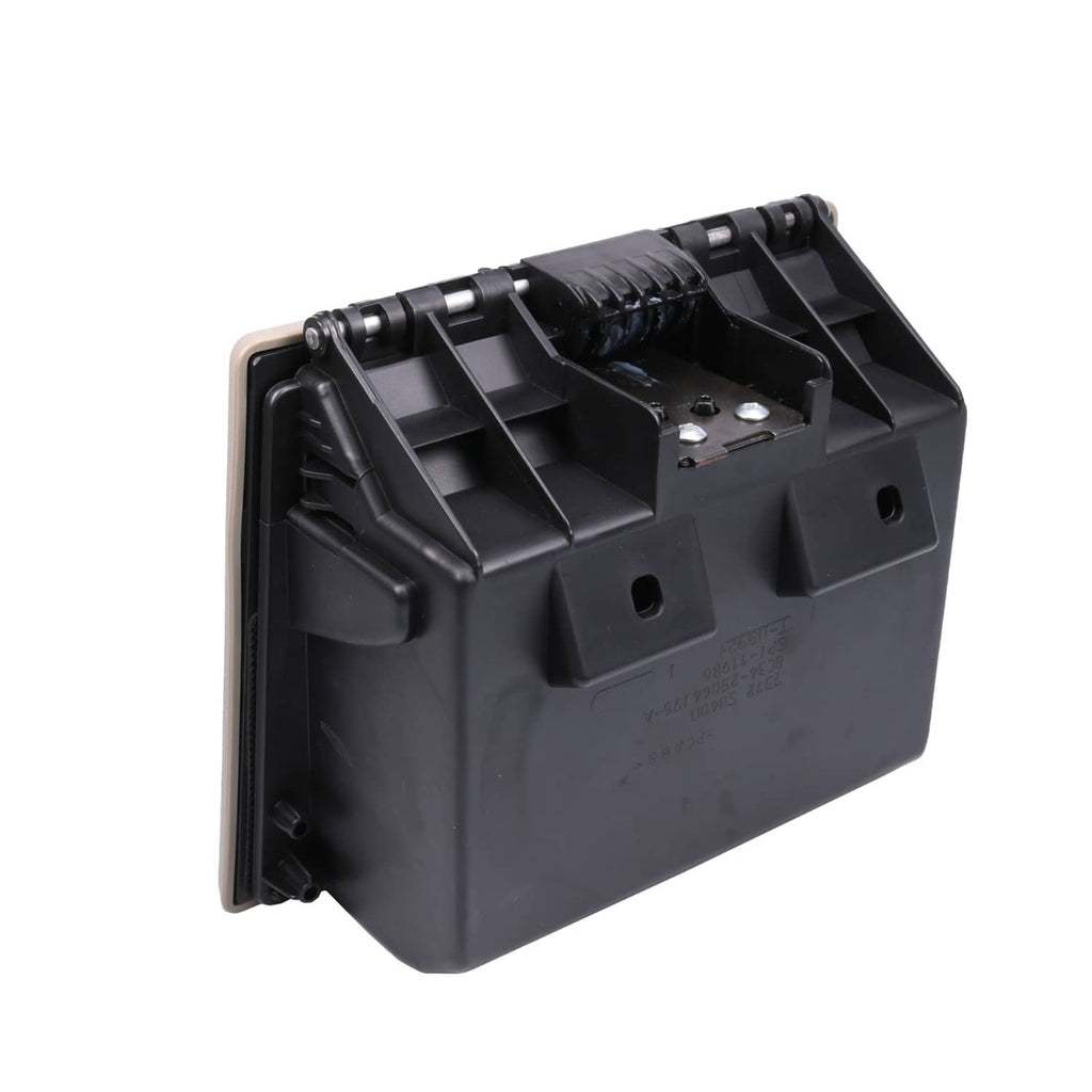 Black dashboard cup holder housing with visible hinge hardware and interior ribs
