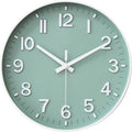 Round green wall clock with white hands and hour markers, battery-powered style.