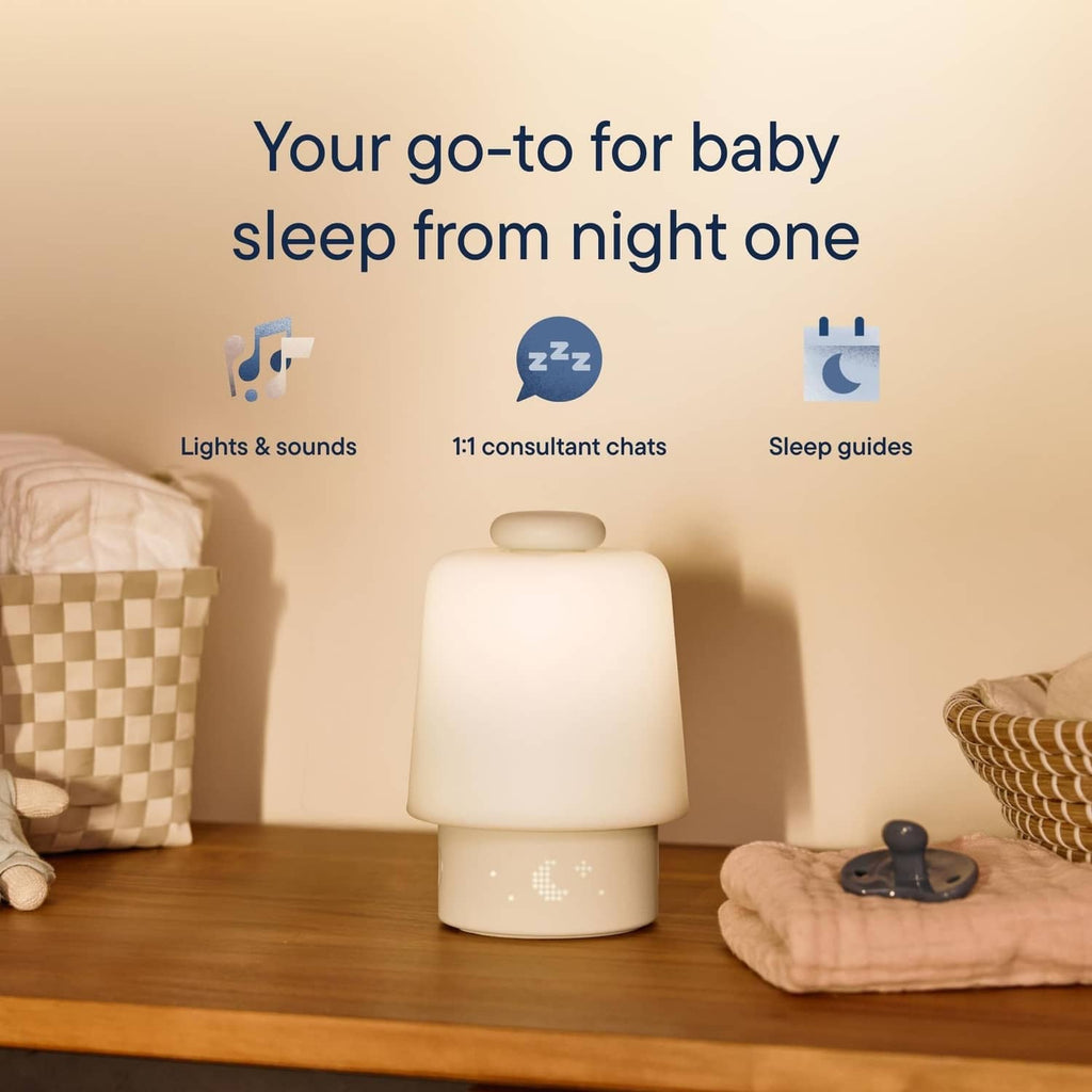 Putty night light sound machine with rounded light dome and smooth round base