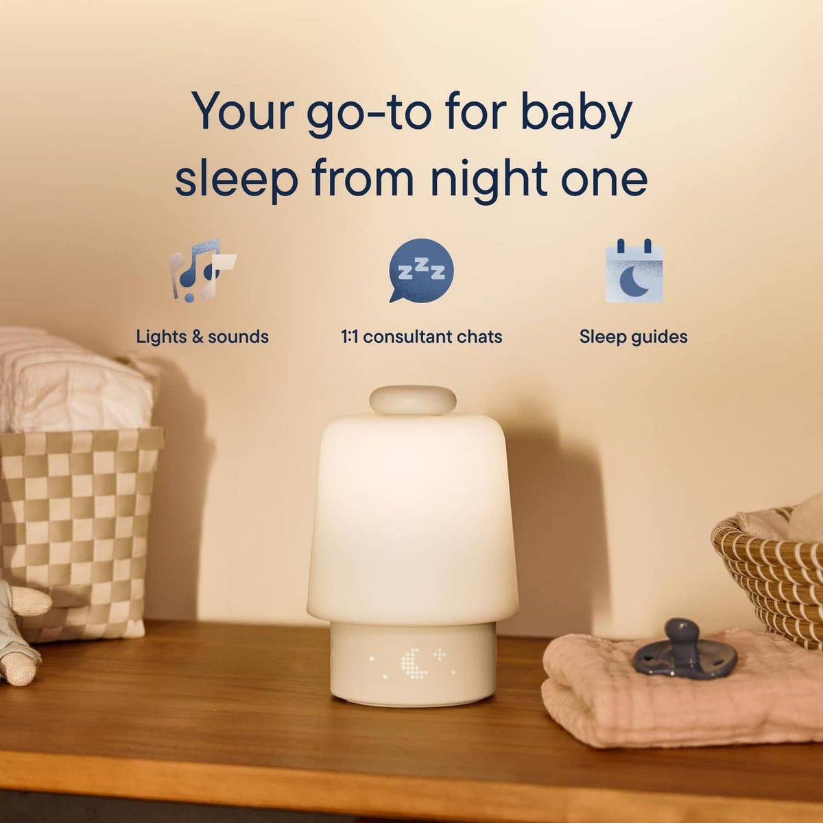 Putty night light sound machine with rounded light dome and smooth round base