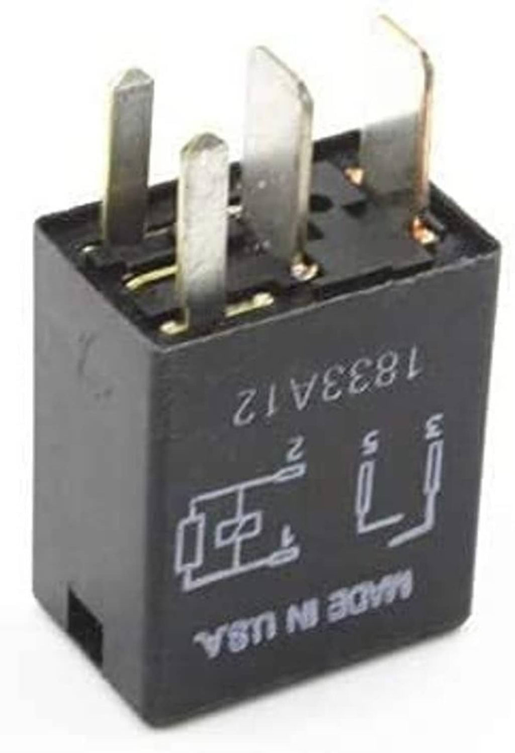 Black 4-pin relay close-up with silver blade terminals and wiring diagram label on top.