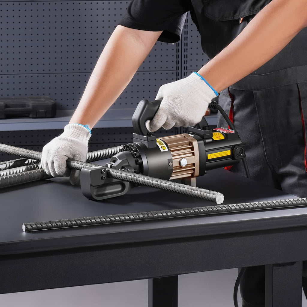 Electric hydraulic rebar cutter clamp engaged on two steel rebar bars
