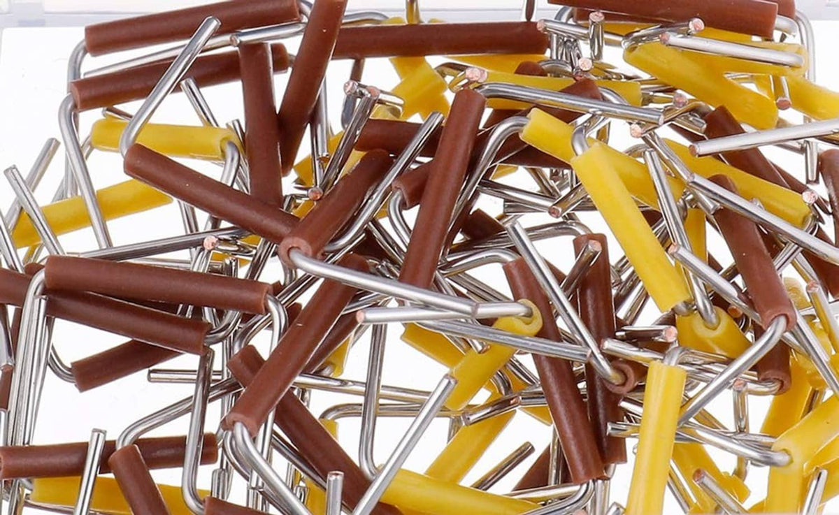 Assorted jumper wires with brown and yellow insulated housings and silver metal pins