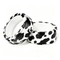 Cow print silicone smart ring cover set (2), white and black pattern.