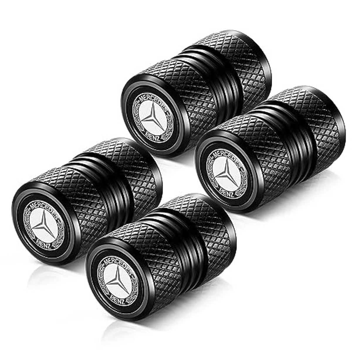 Black tire valve stem caps set with textured sides and Mercedes-Benz emblem on top
