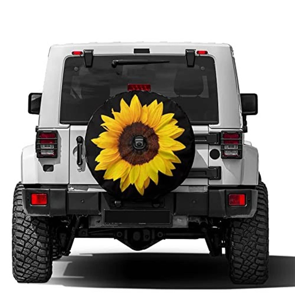Black spare tire cover with sunflower graphic and round backup camera hole opening