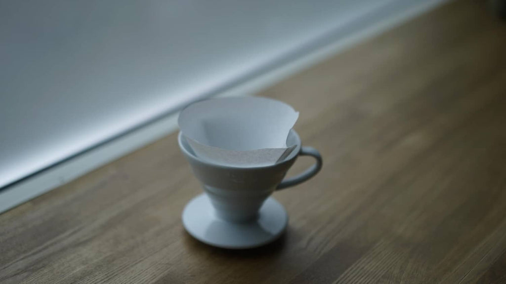 White paper coffee filter in cone dripper, Size 02