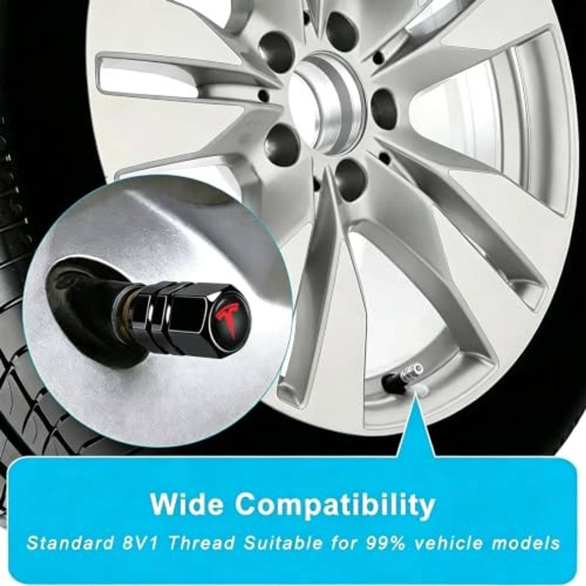 Black metal tire valve stem cap with red emblem on a silver alloy wheel