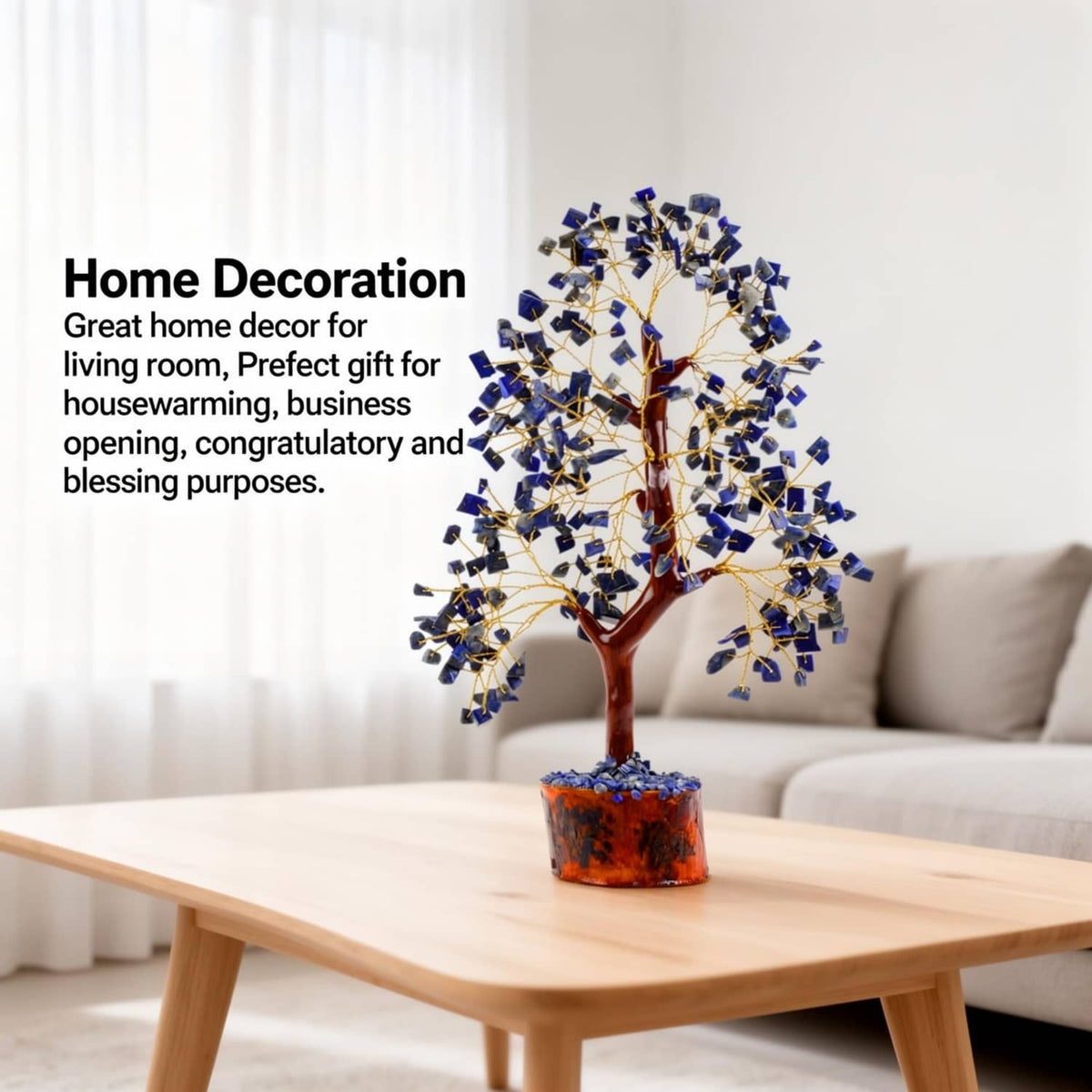 Lapis lazuli crystal tree ornament with golden wire branches and amber wooden base on tabletop