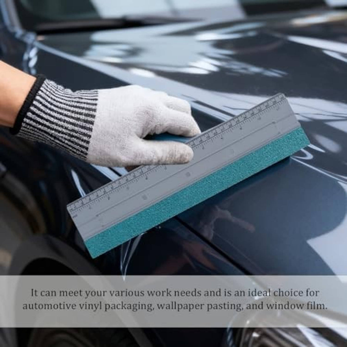 Car window felt squeegee tool on car glass with gray ruler and blue felt pad