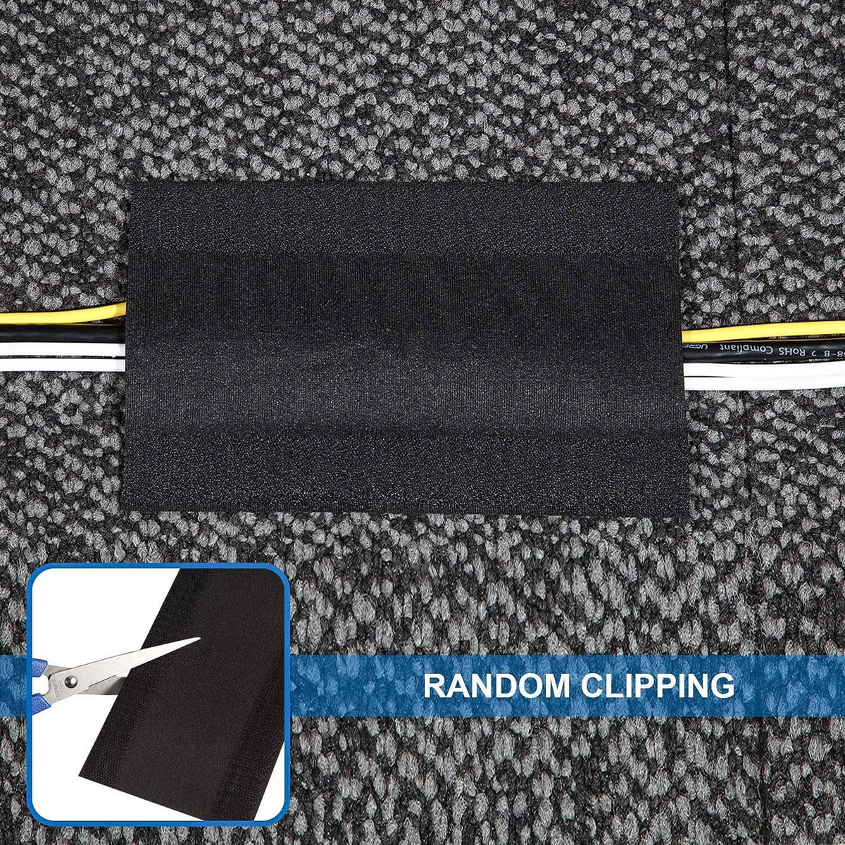 Black cord cover section on carpet with clipped edge over yellow cables