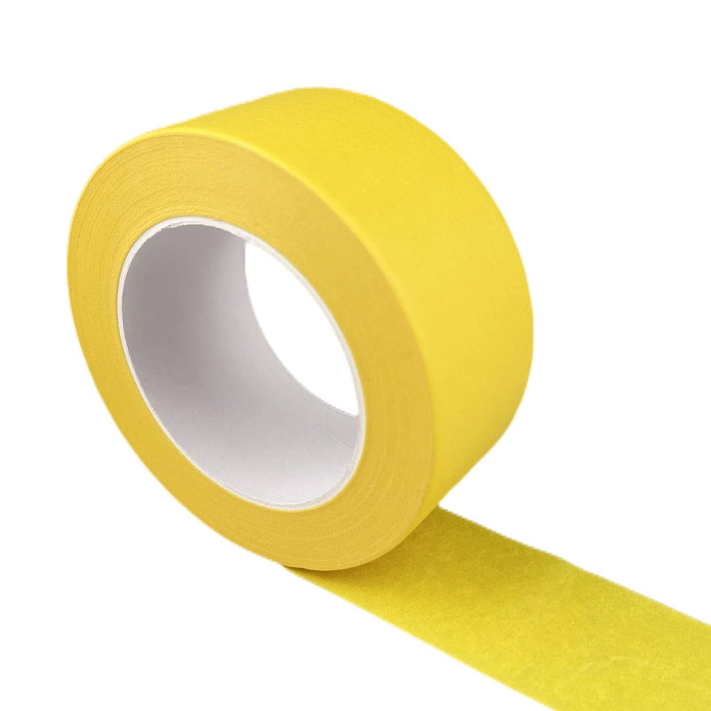Yellow masking tape roll with trailing strip and inner core