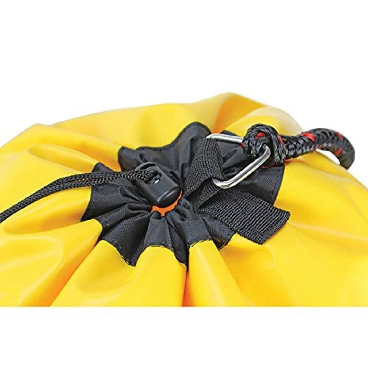 Close-up of black cinch straps and silver metal rings on yellow buoy bag