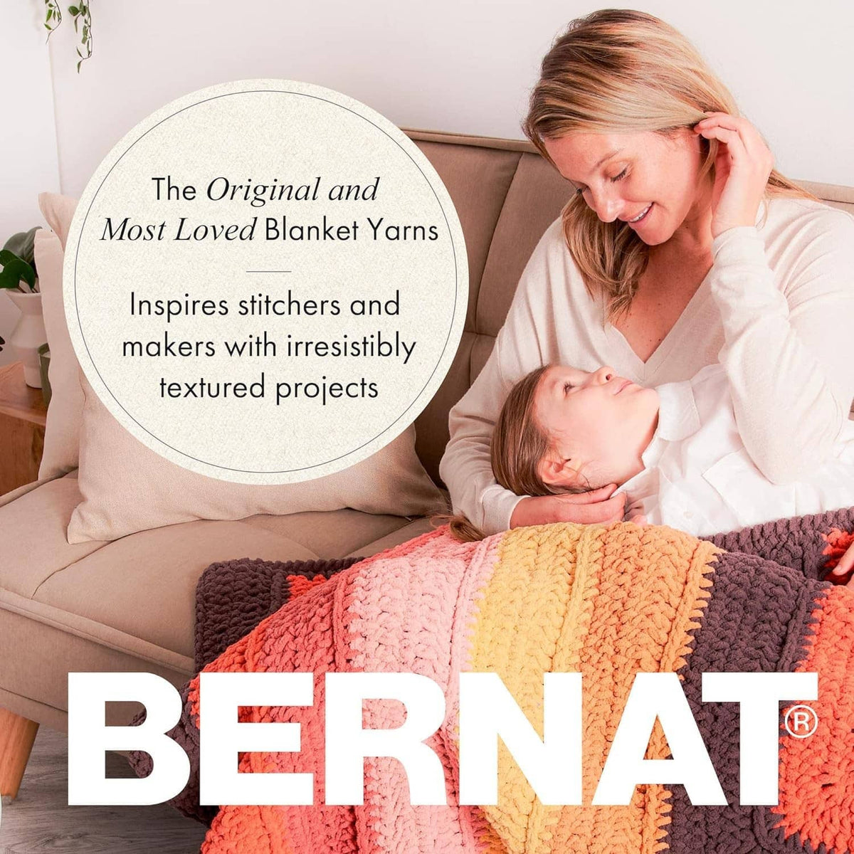 Warm multicolor striped chenille-style blanket draped across a sofa