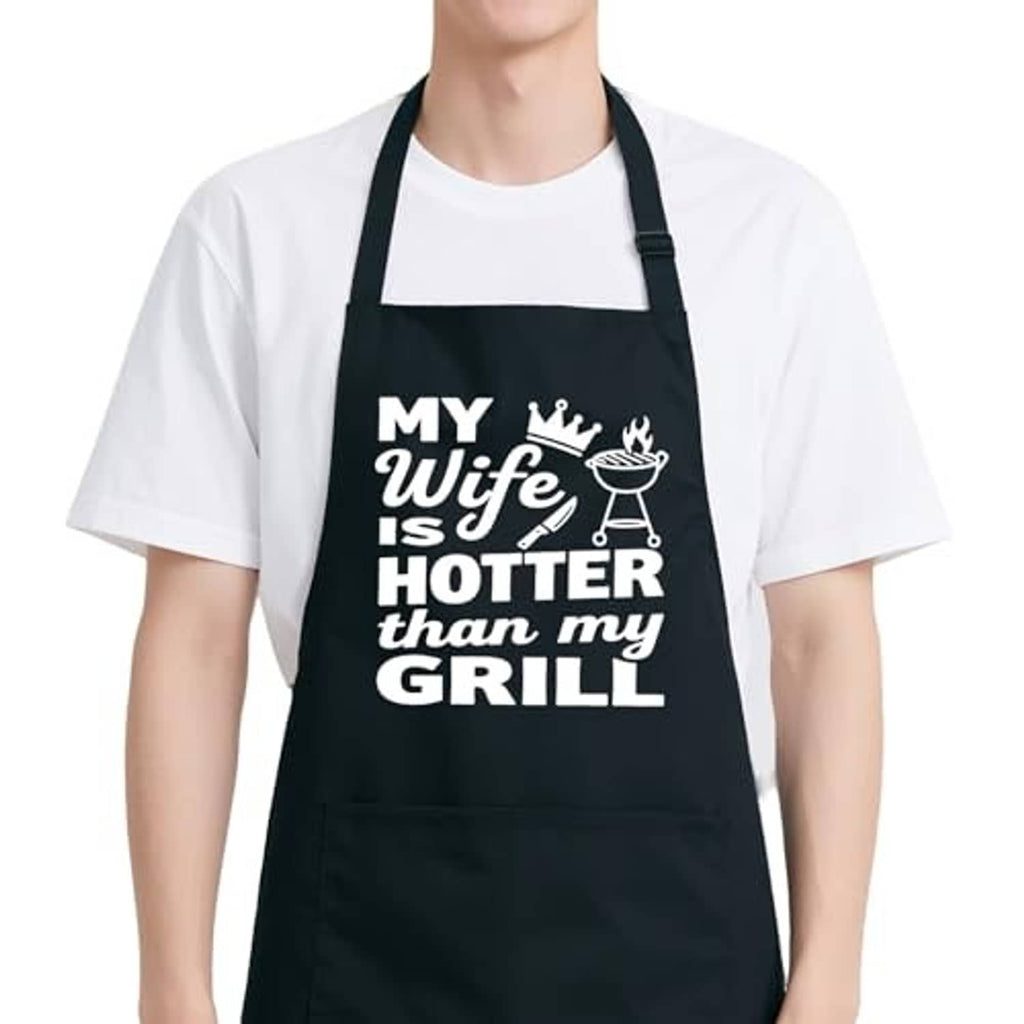 Black BBQ apron with 'MY Wife is HOTTER than my GRILL' front text and neck straps