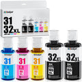 Ink bottle set with black, cyan, magenta, and yellow bottles in retail box