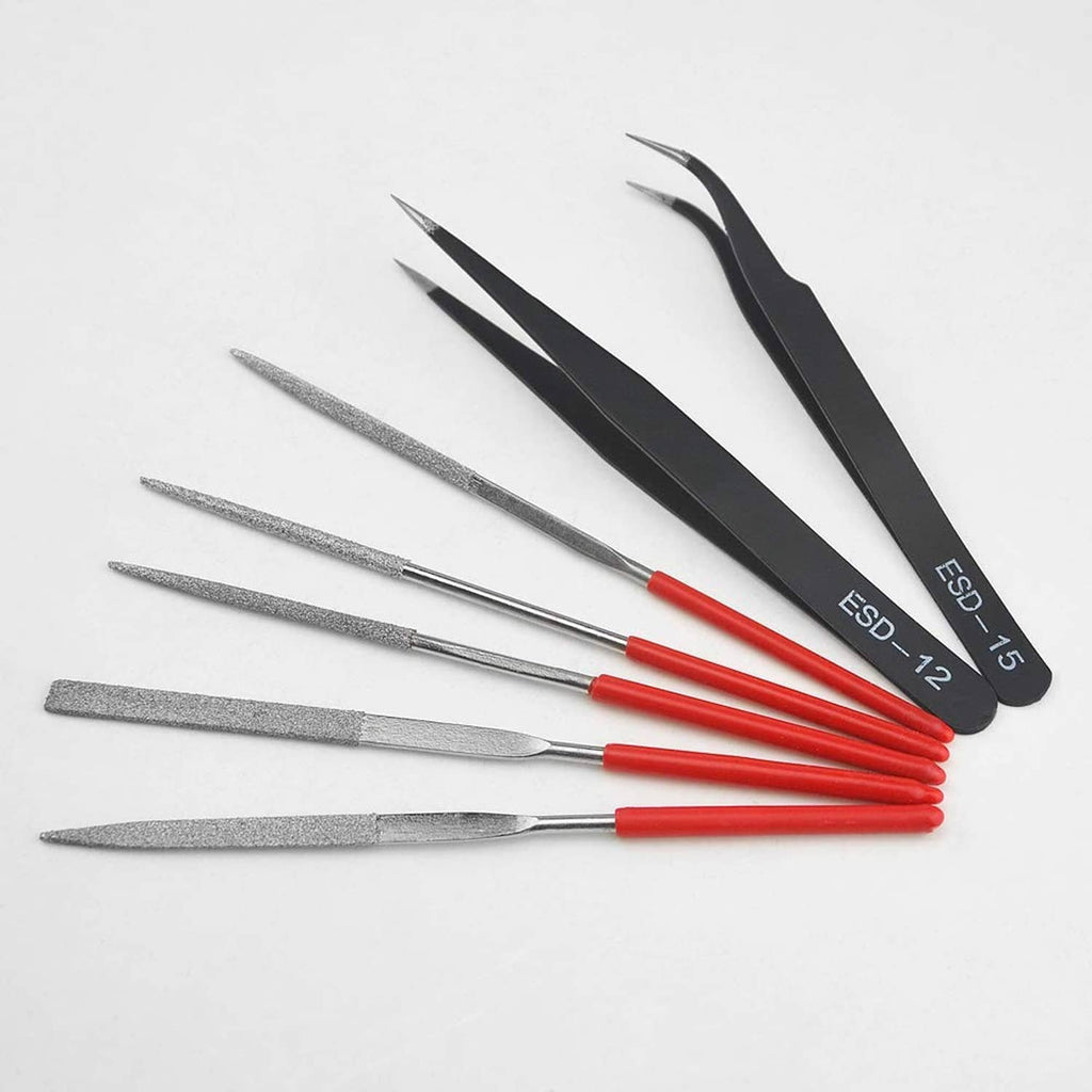 ESD tweezers and metal needle files with red handles for model detailing