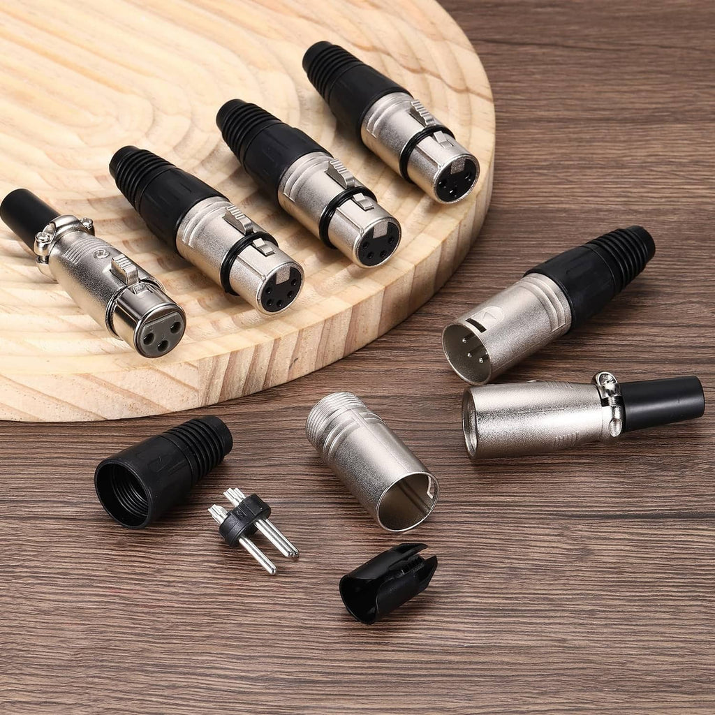 Set of 4-pin XLR female connectors with black grips, silver metal shells, and pin parts