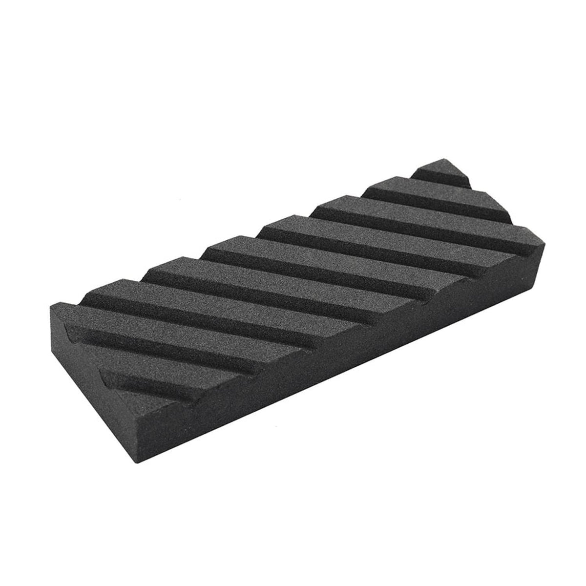 Black flattening whetstone with ridged grooves and gritty surface