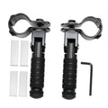 Pair of black foldable motorcycle foot rests with textured grips and mounting brackets