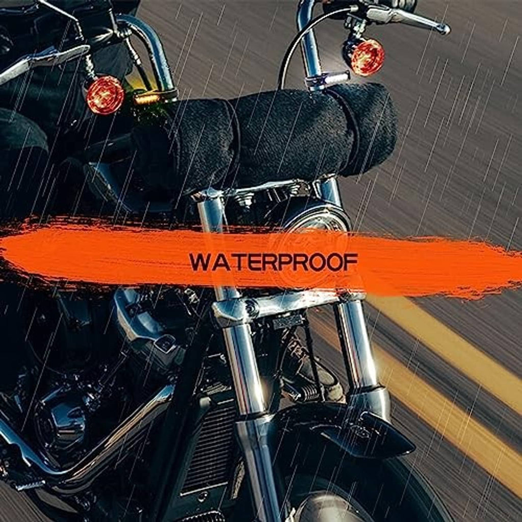 Waterproof front LED turn signal lights, amber glow on motorcycle fork