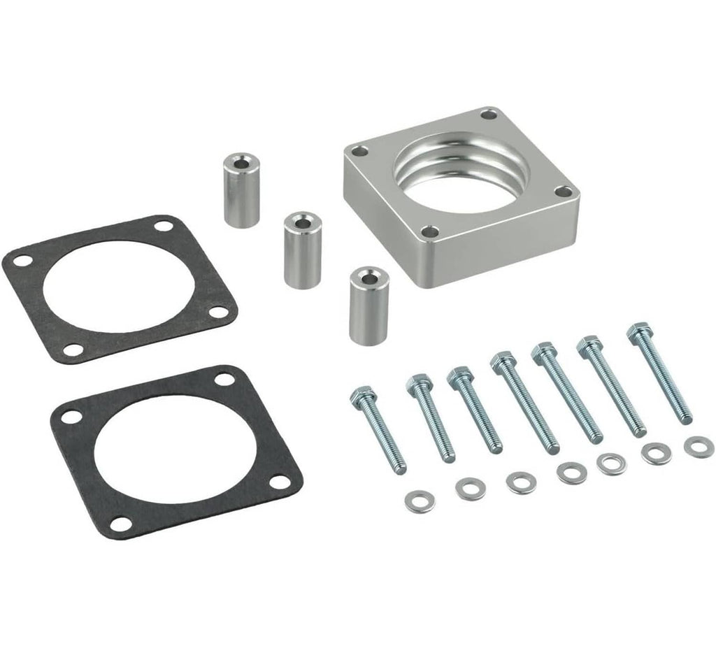 Silver 4-bolt throttle body spacer kit with gaskets, bolts, and sleeves