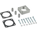 Silver 4-bolt throttle body spacer kit with gaskets, bolts, and sleeves