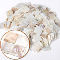 Beige and cream mother-of-pearl mosaic tile pieces, iridescent shell finish