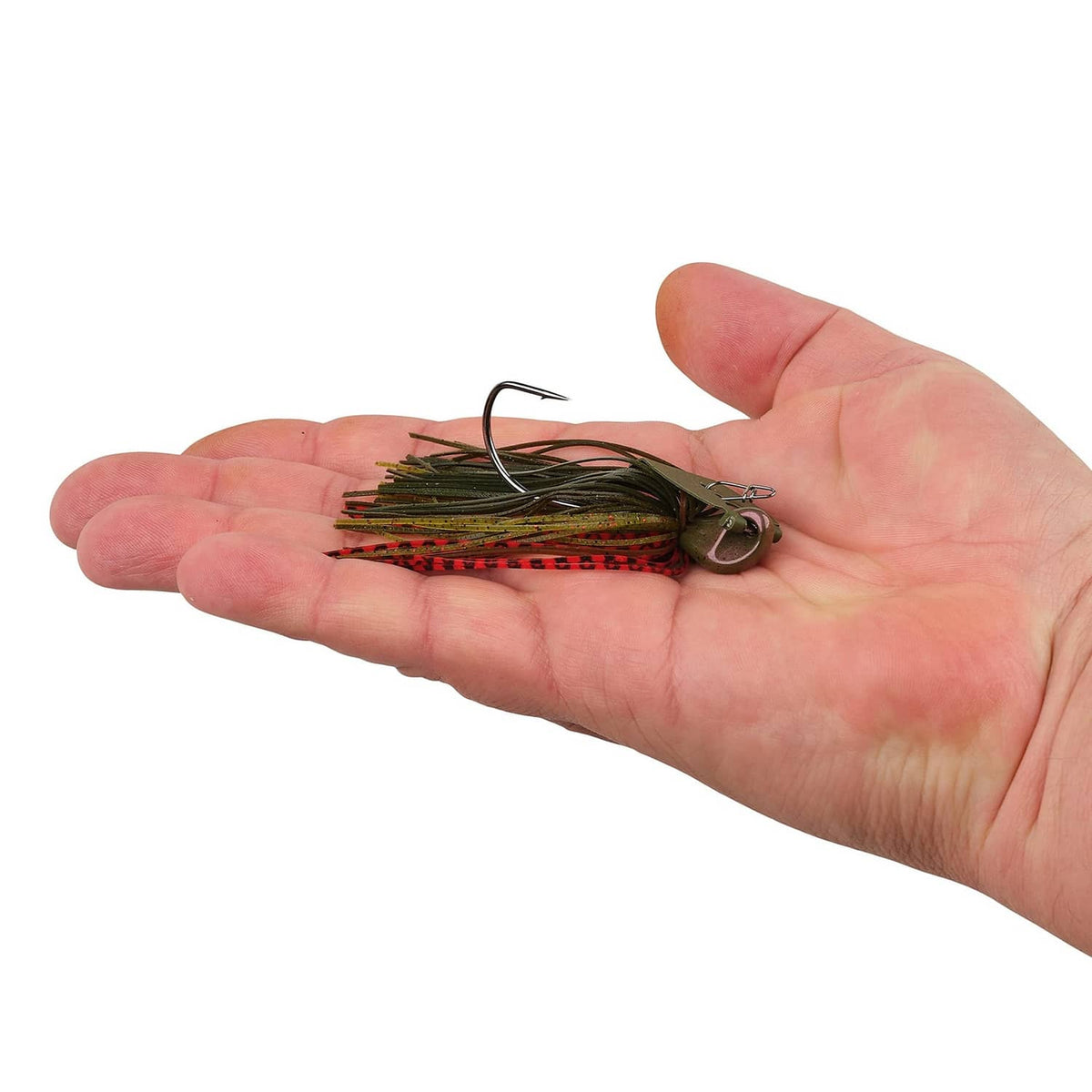 Camouflage-striped bladed jig with multicolor skirt held in a hand