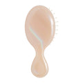 Iridescent cream mini detangling hair brush with plastic bristles on a rounded pad