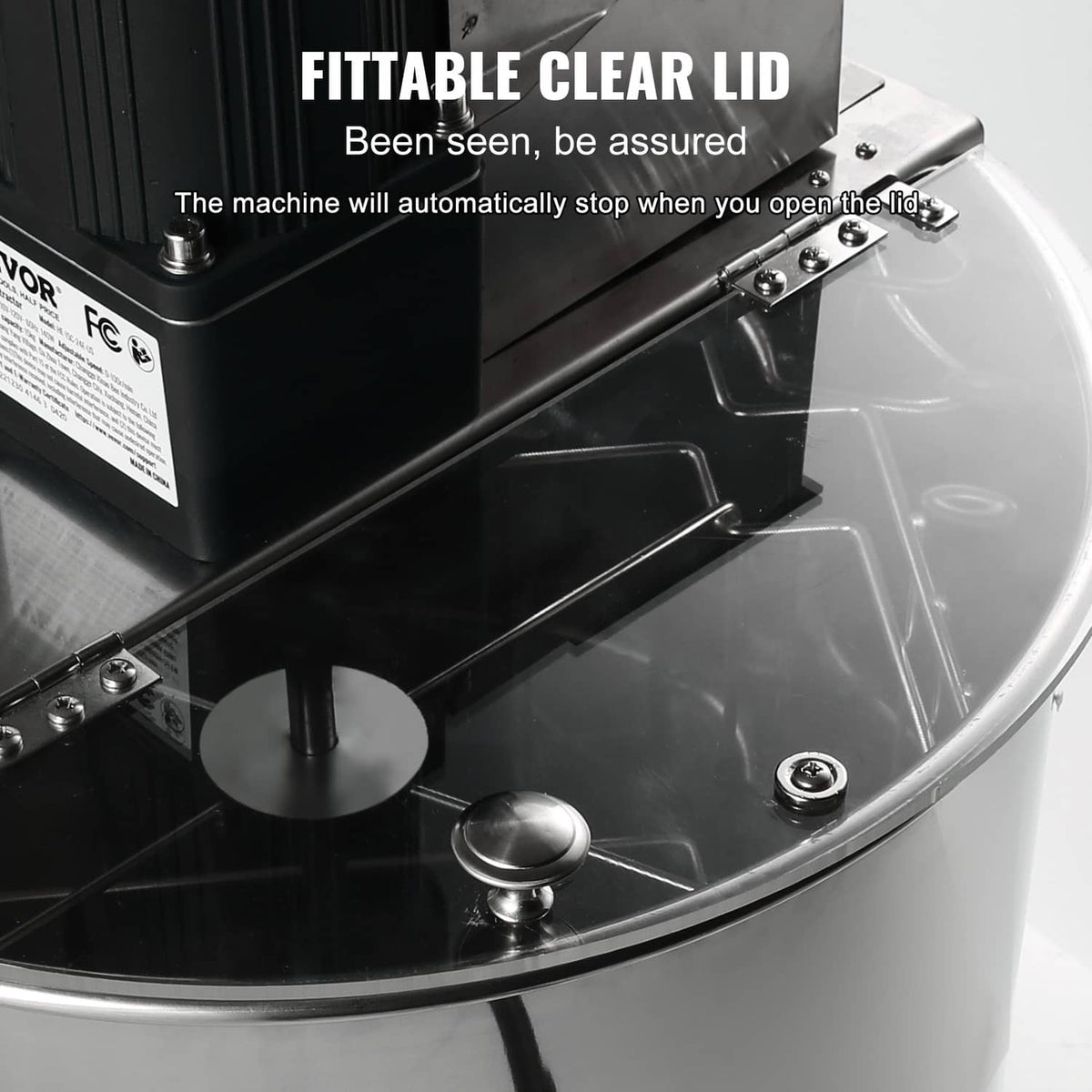 Electric honey extractor with hinged clear lid and internal spinner mechanism