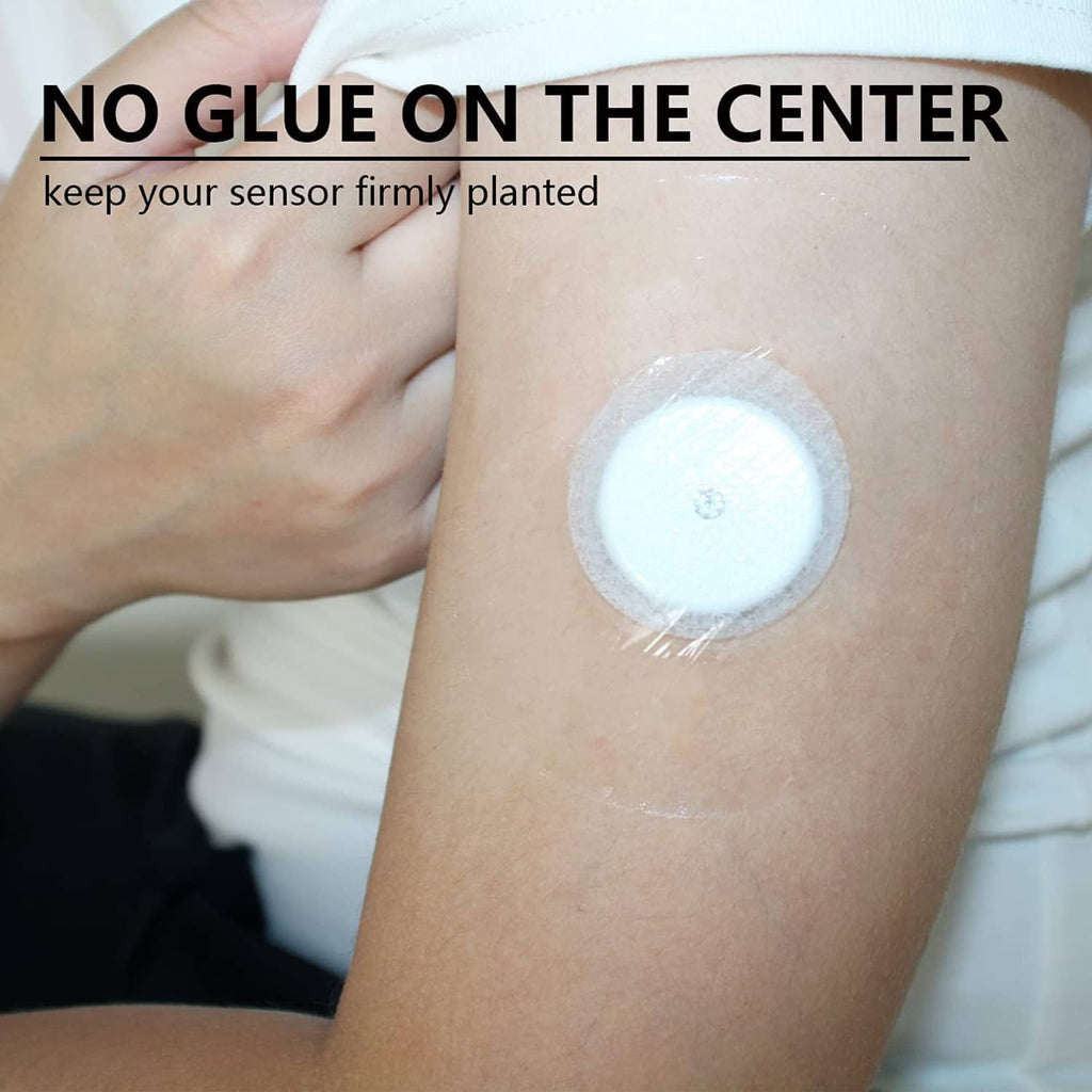 Round white adhesive sensor patch on upper arm, water-resistant