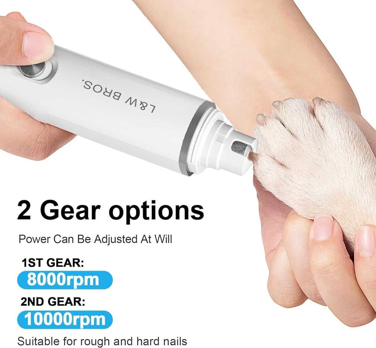 White dog nail grinder being held while grinding a light-colored paw
