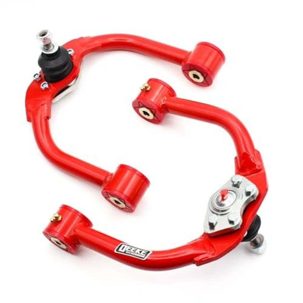 Red front upper control arms with ball joints, bushings, and silver brackets