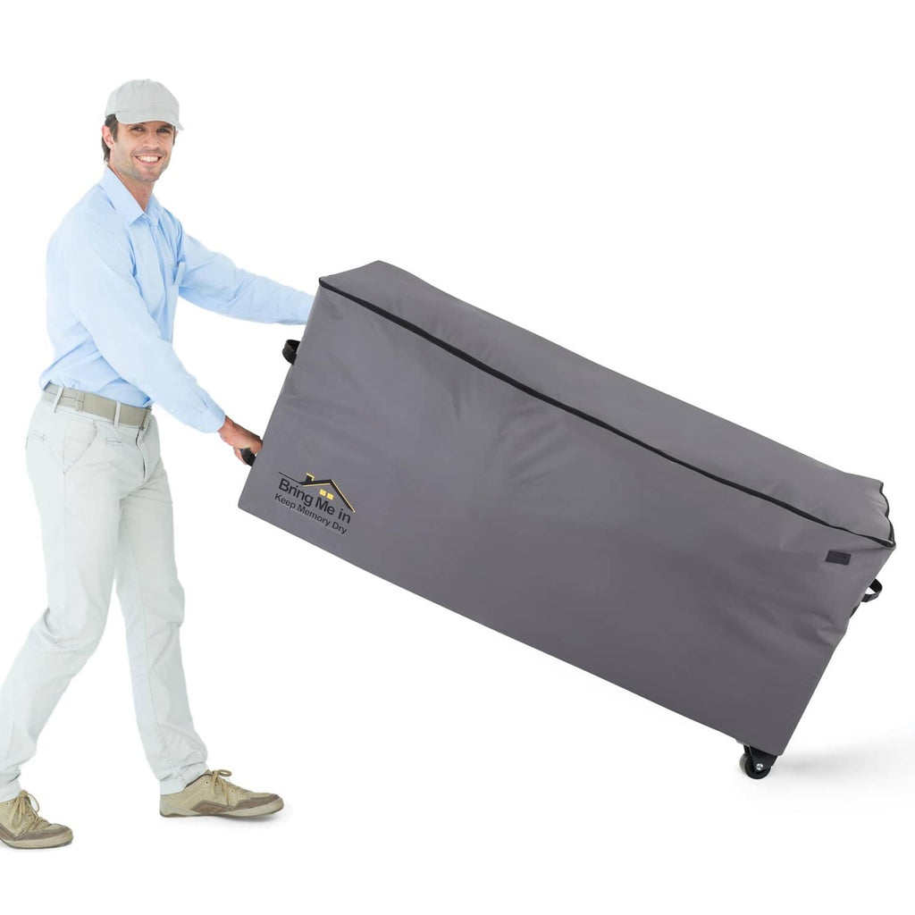 Grey rolling cushion storage bag with wheels and fold-away padded handle
